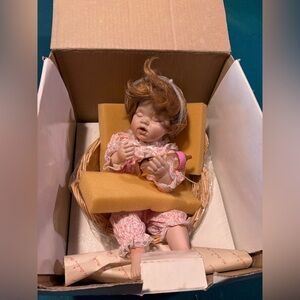 Vintage porcelain “Megan” Doll in Pink Floral Outfit with Bottle and burp cloth